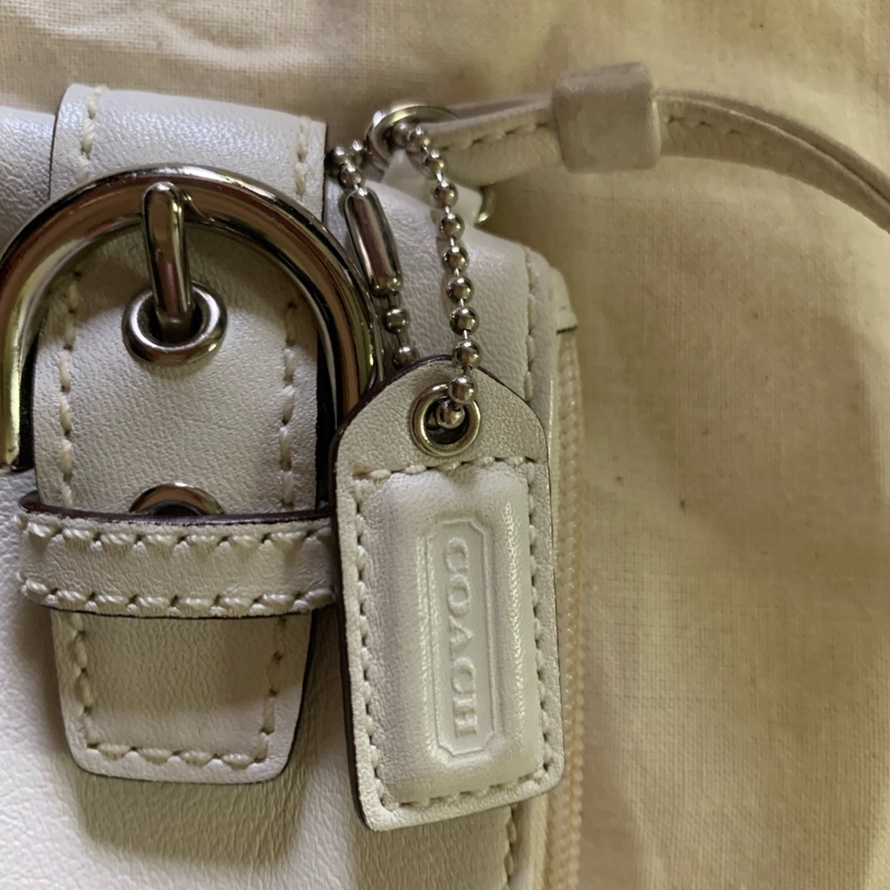 Coach wristlet white leather, great condition.